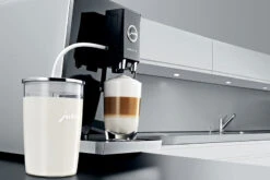 JURA Glass Milk Container 12 JURA Glass Milk Container -Coffee Supplies Store 5893 original container on counter